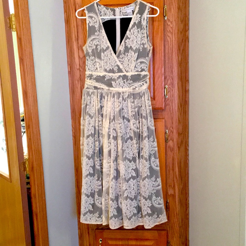 Mid length ivory lace sleeveless dress